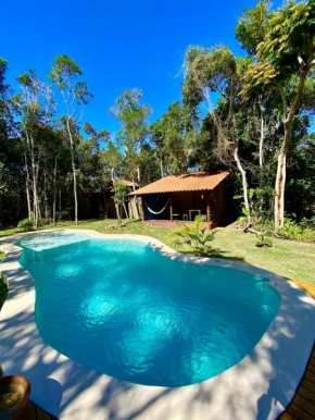 Casa da floresta vista mar